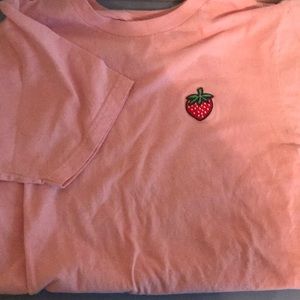 Pink short sleeve shirt with strawberry